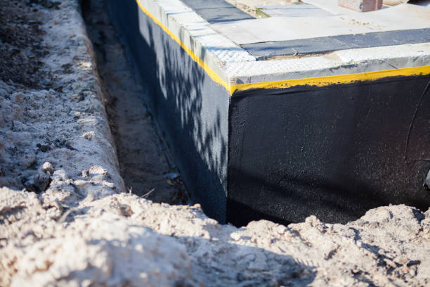 Professional Basement Waterproofing technician working in Norwood, PA
